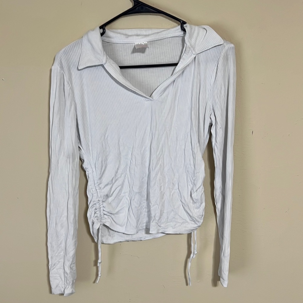 No boundaries, White long sleeve with collar. Has adjustable sides